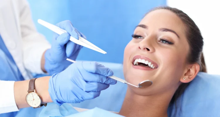 woman smiling before treatment at the best root canal specialists near Grovewood