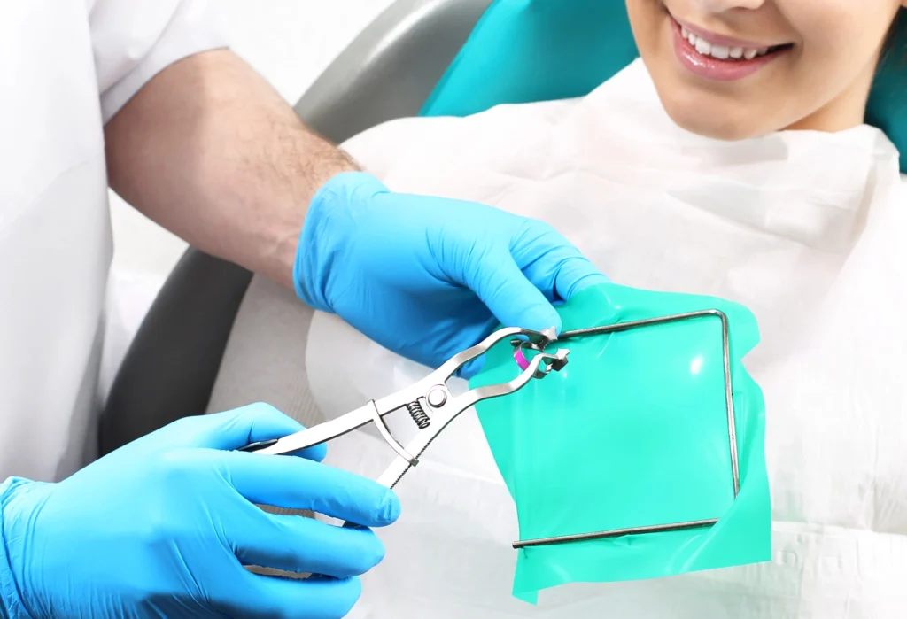 dentist holding tools for root canal in st petersburg