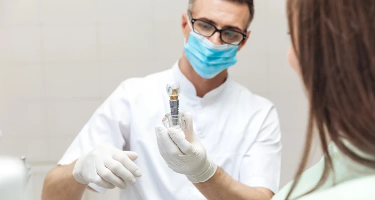dentist in clearwater talking about implants