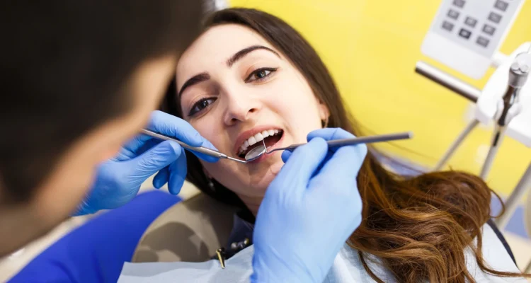 woman getting dental cleanings in Clearwater FL
